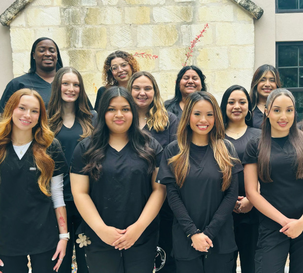 Medical Assistant School Students posing for photo outside of training facility.